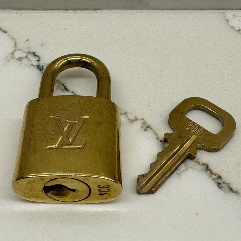 Louis Vuitton gold Padlock Keychain #304 used in excellent condition. - Picture 4 of 5